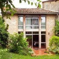 Grande baie ouverte sur le jardin, en façade Sud
