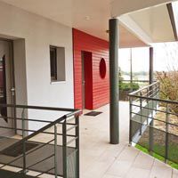 Coursive extérieure desservant les 4 chambres